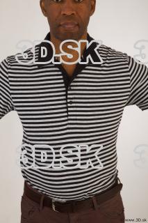 Upper black white striped shirt brown jeans of Arturo 0001